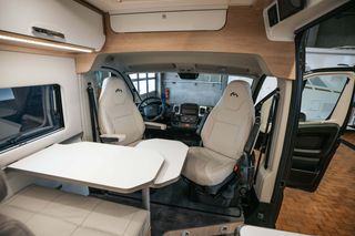 Dining area in our Mooveo travel van with rotating front seats