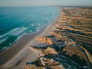 Bird's eye view of campers on the coast in Portugal during the winter